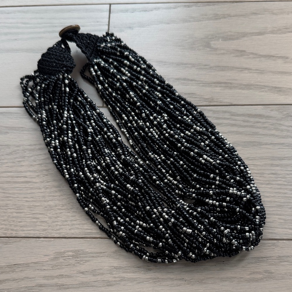 Elegant Black and Gold Multi-Strand Beaded Necklace